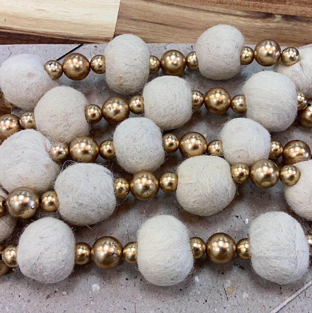 72” wool felt garland…cream felt and gold beads