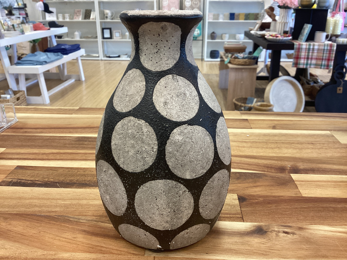 Terra cotta vase with wax relief dots