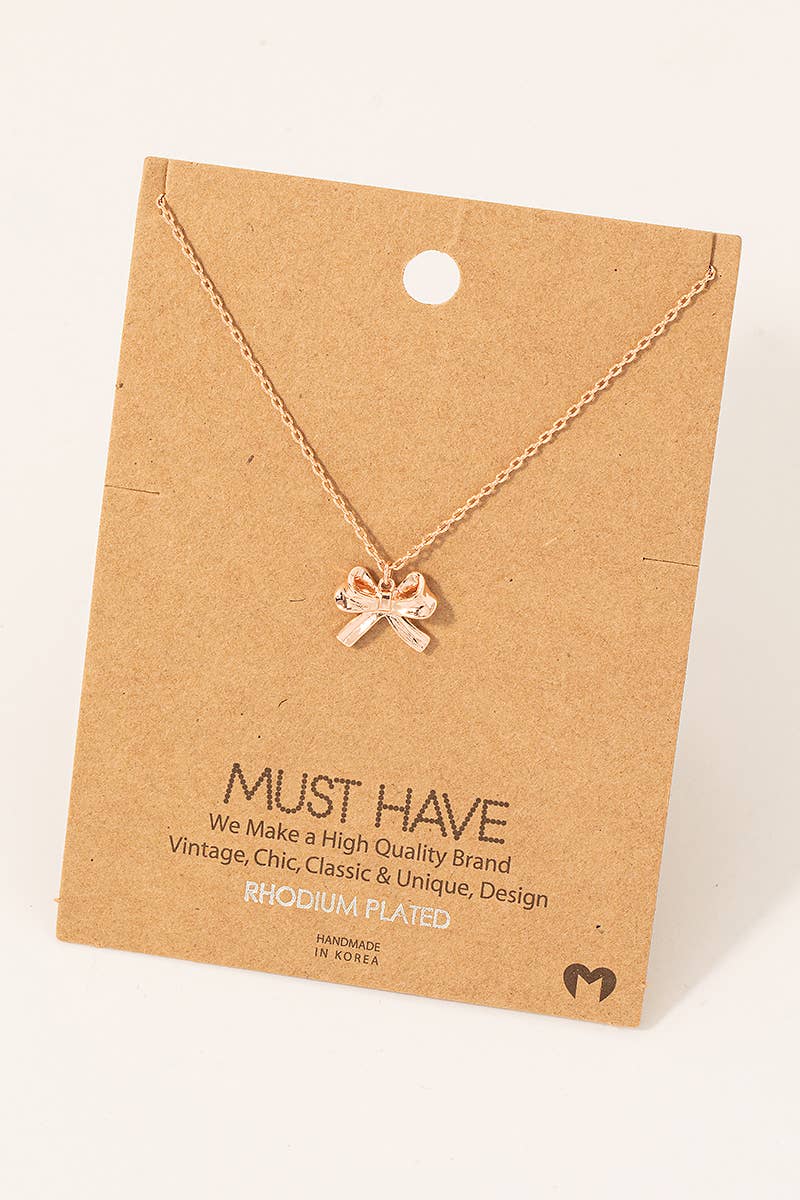Gold Dipped Ribbon Bow Necklace: Gold
