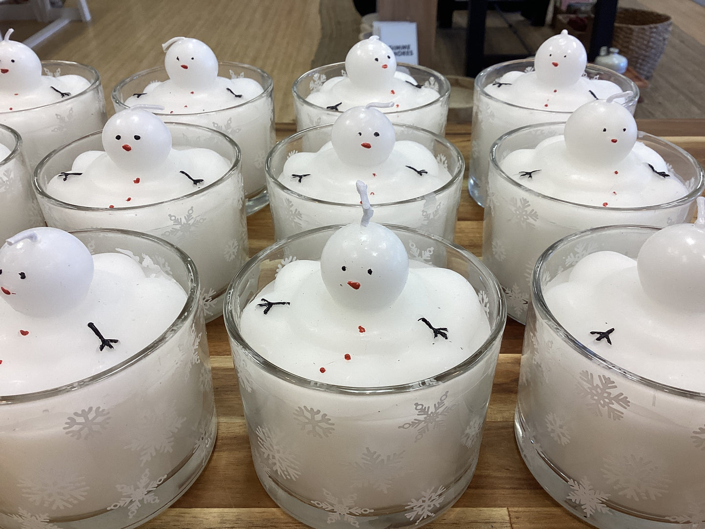 Snowman candle, melting snowman