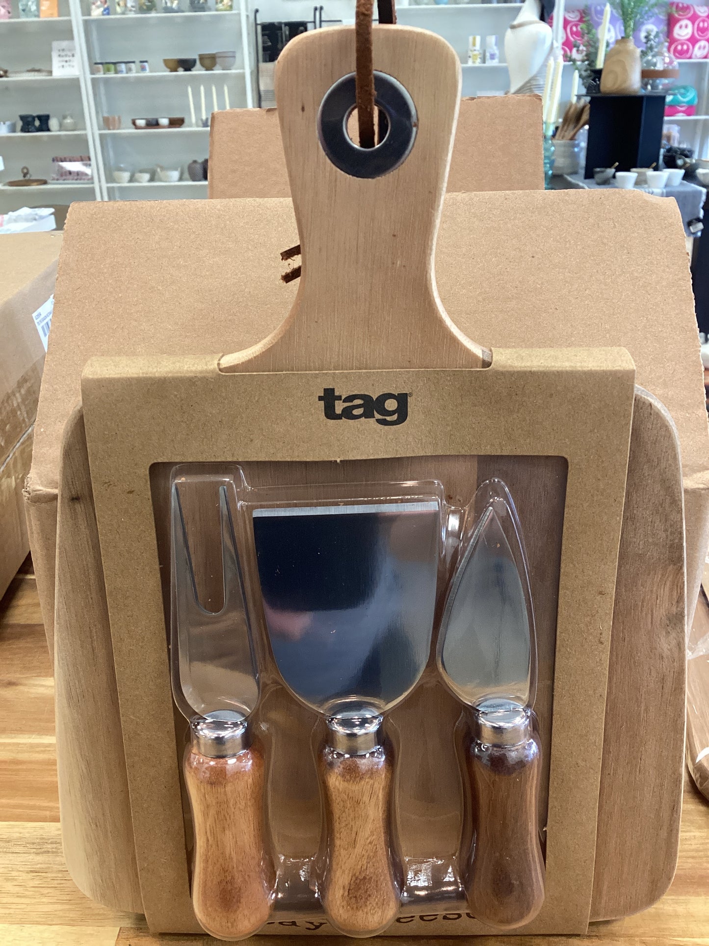 Paddle board and cheese utensils