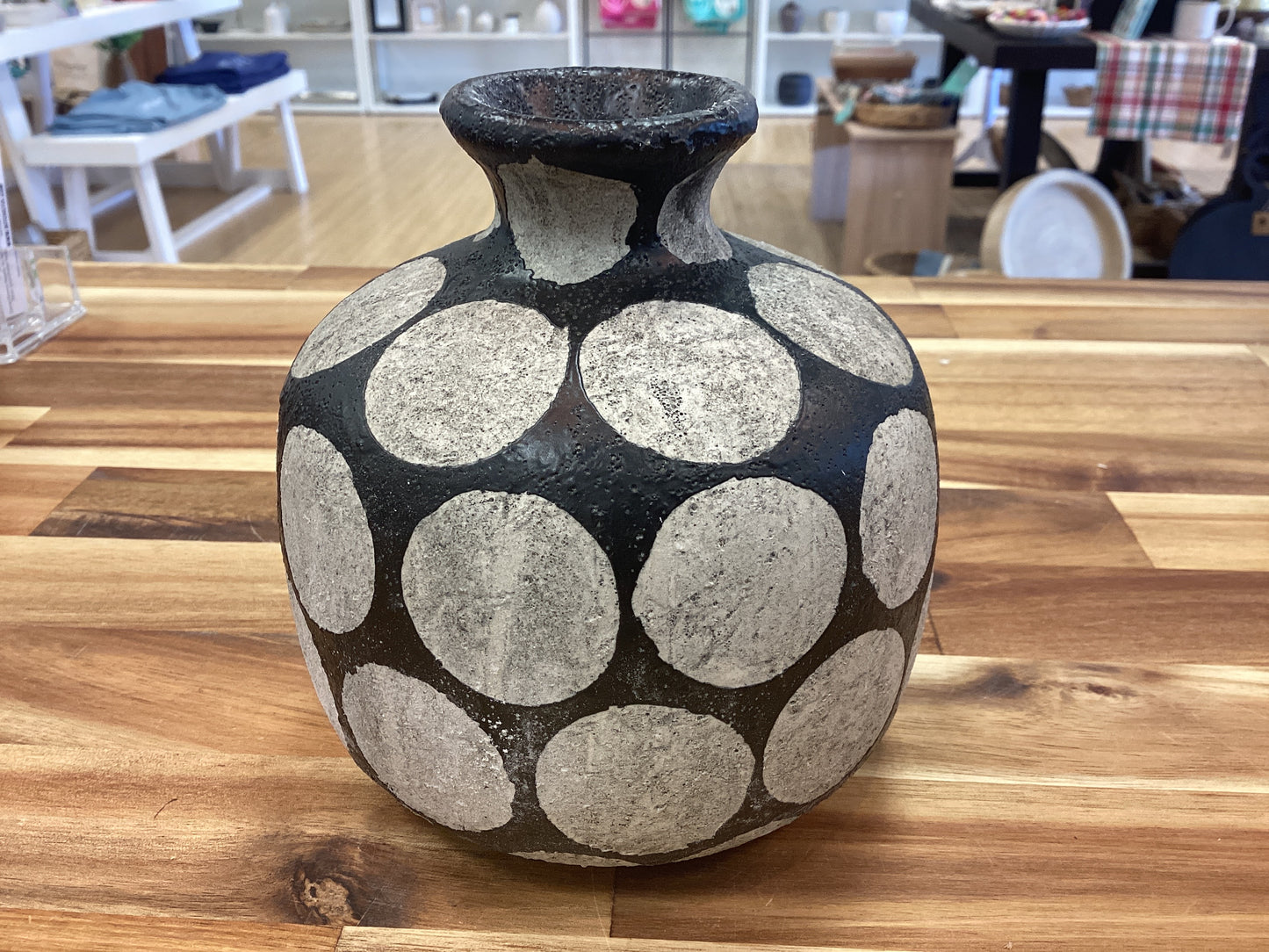 Terra cotta vase with wax relief dots