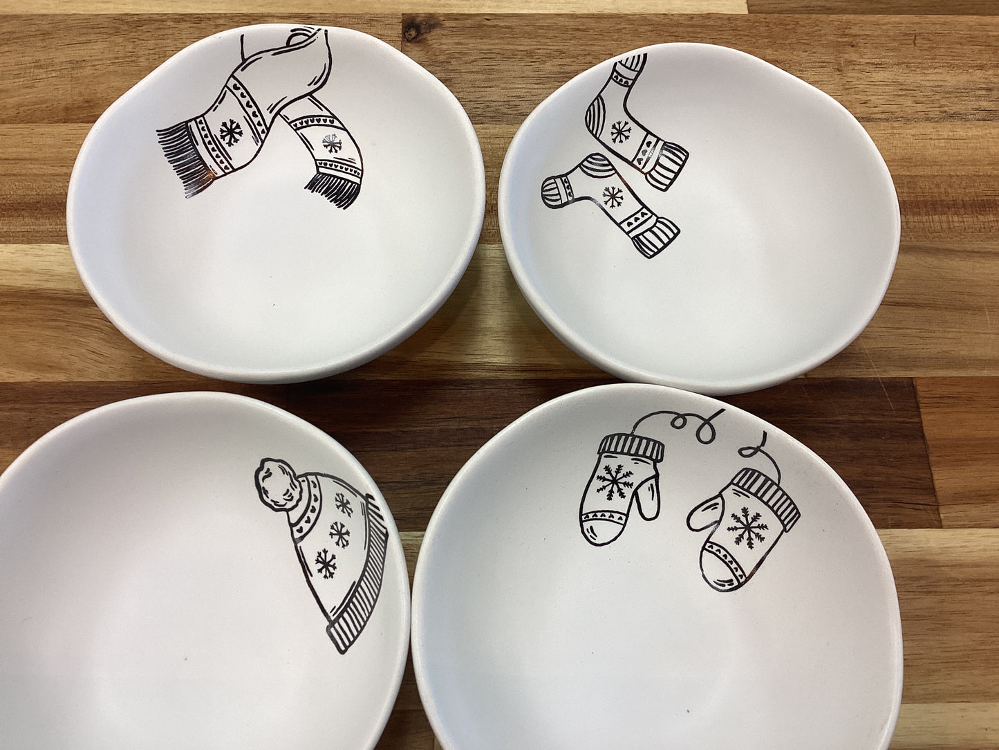 Bowl w/ winter apparel…gloves,hat,scarf,socks