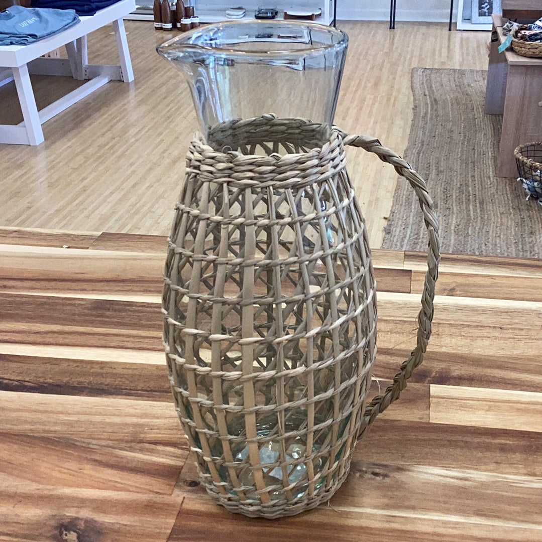 Glass pitcher with sea grass cover