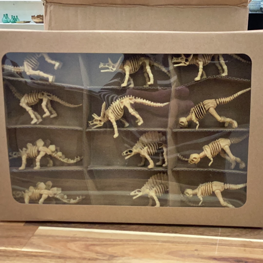Plastic dinosaur skeletons…set of 12