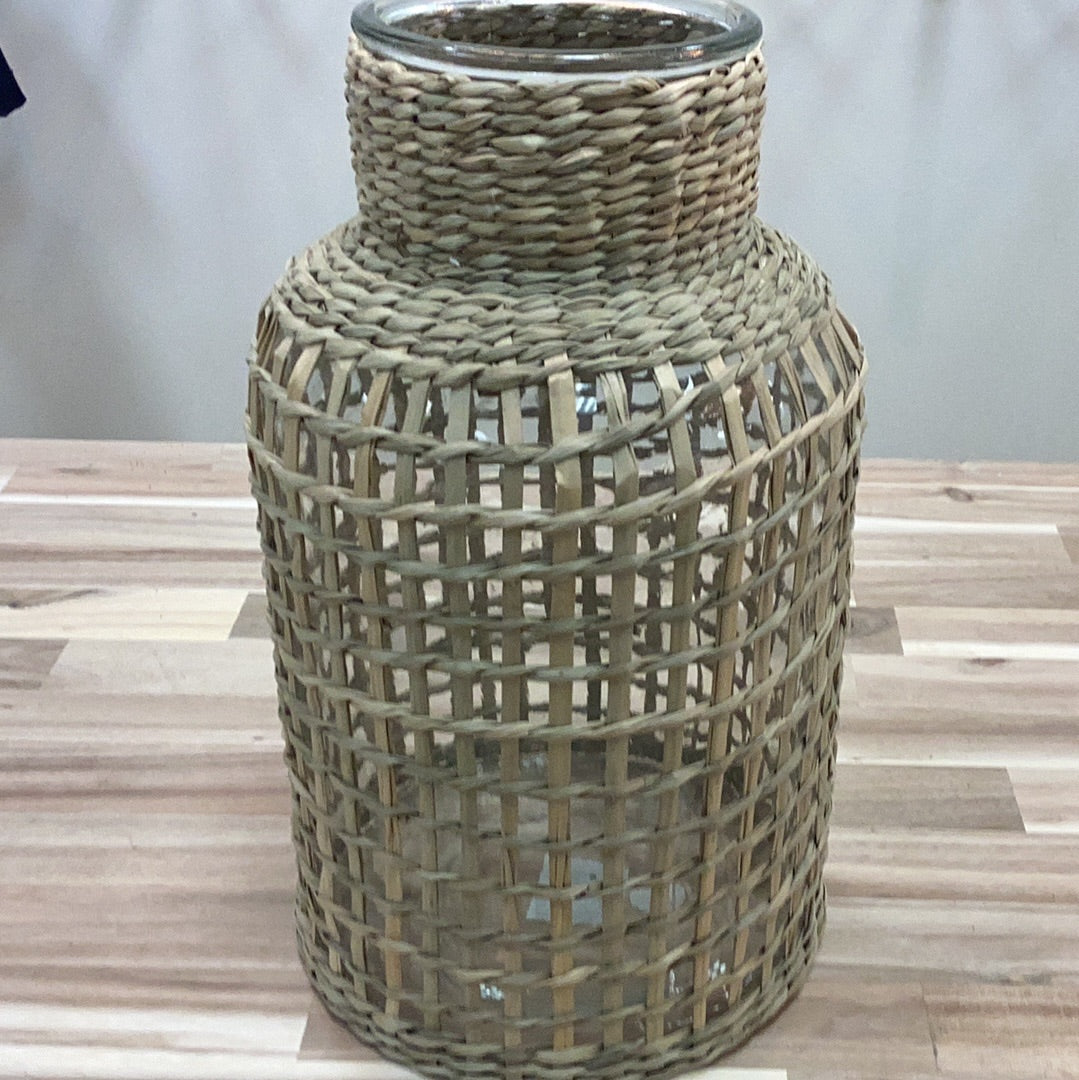 Glass vase/hurricane with woven sleeve