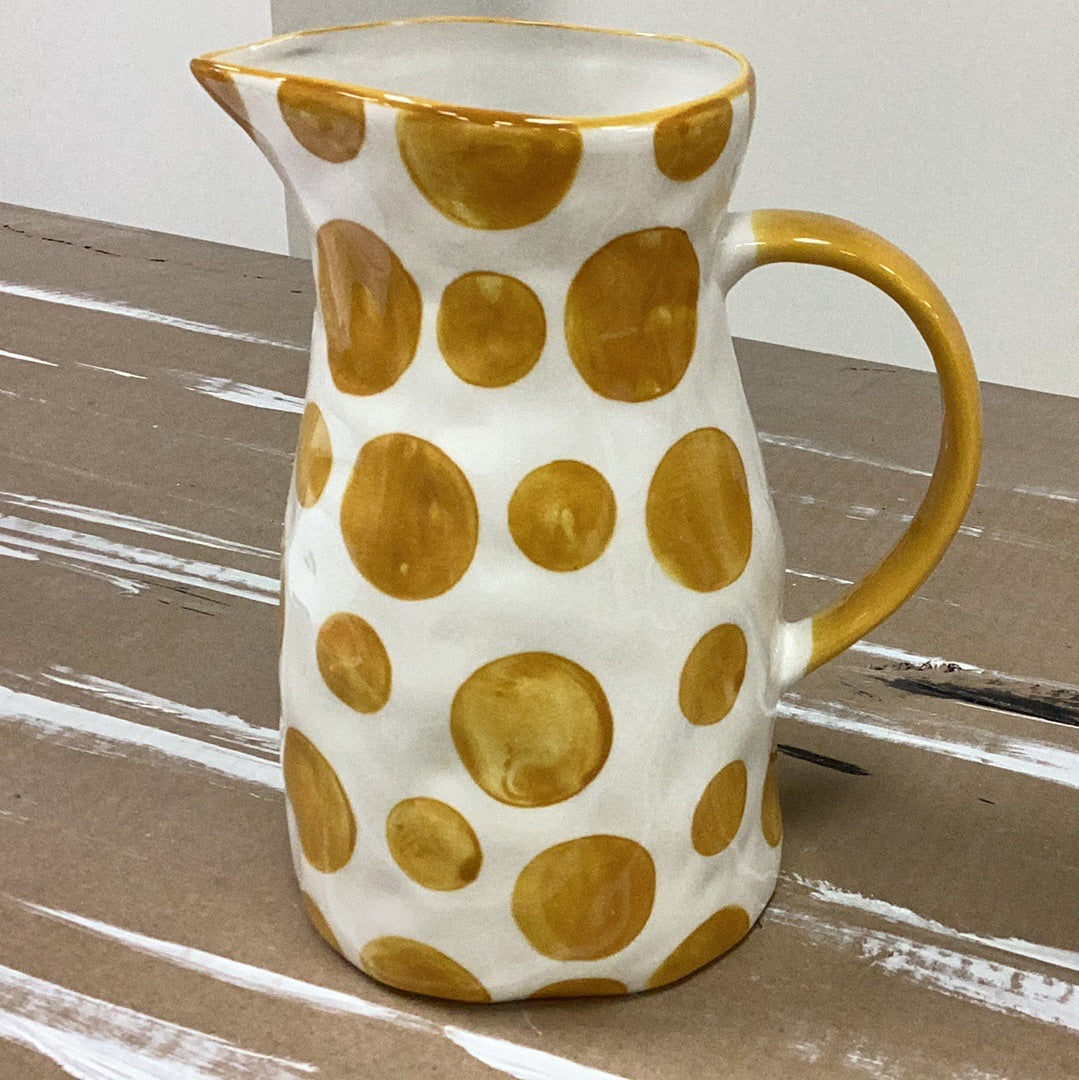 Hand painted stoneware pitcher with yellow dots