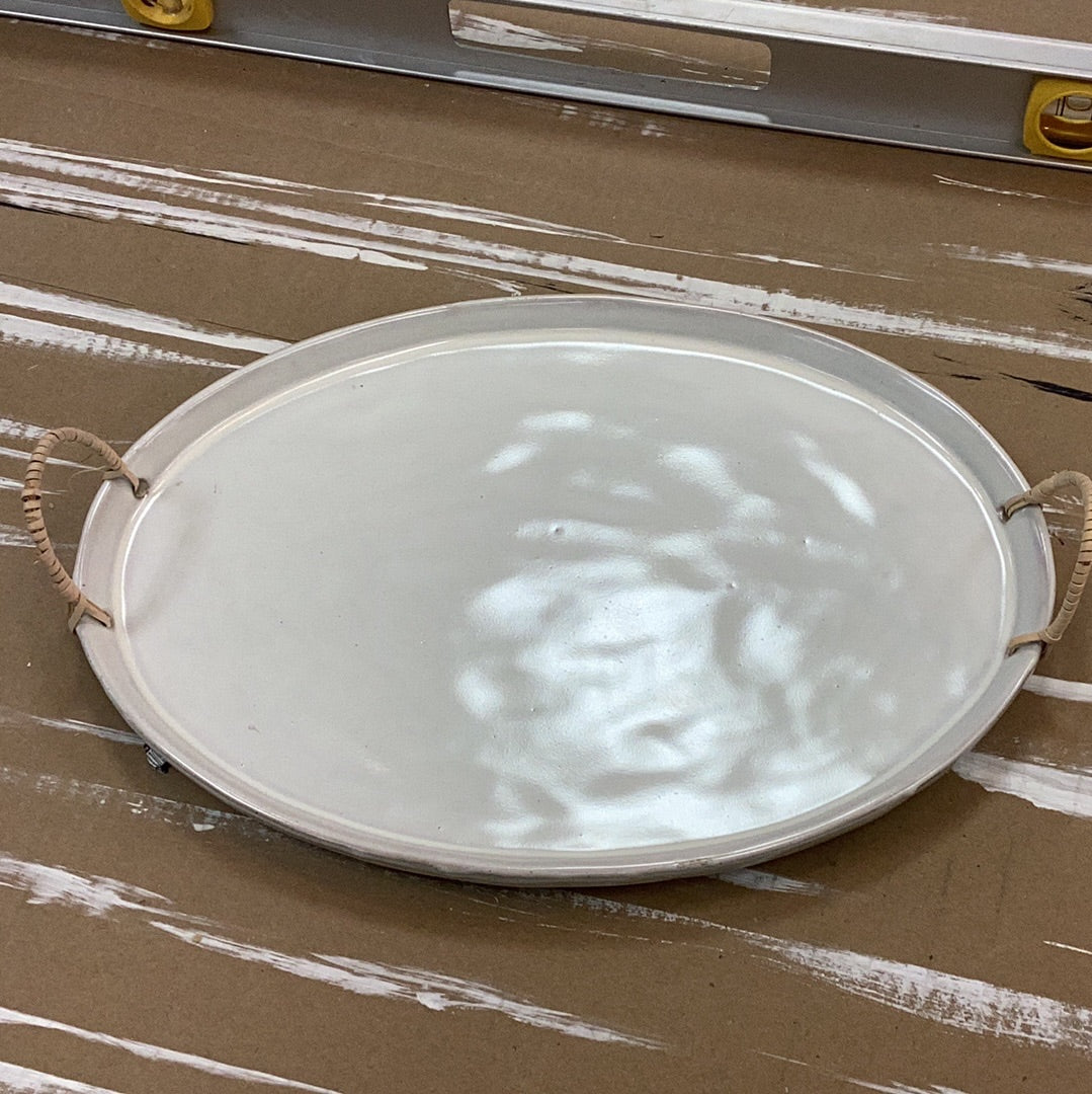 Stoneware platter with rattan wrapped handles