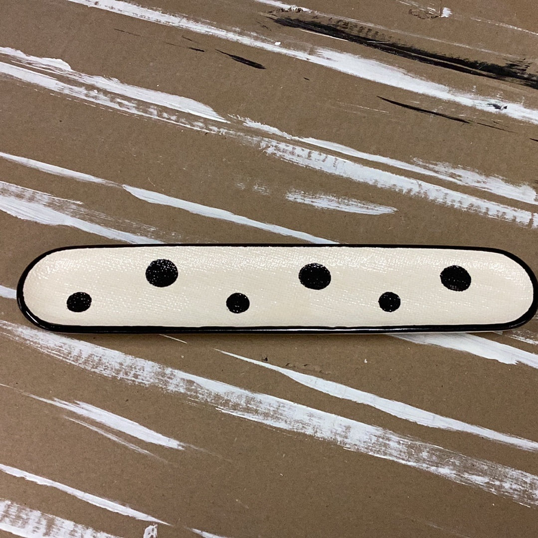 Oval hand painted stoneware tray with dots