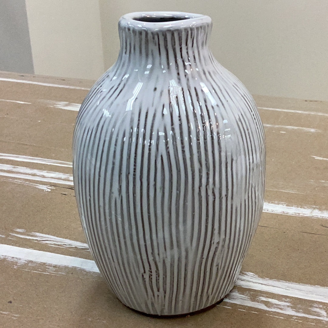 Small terracotta vase with engraved lines