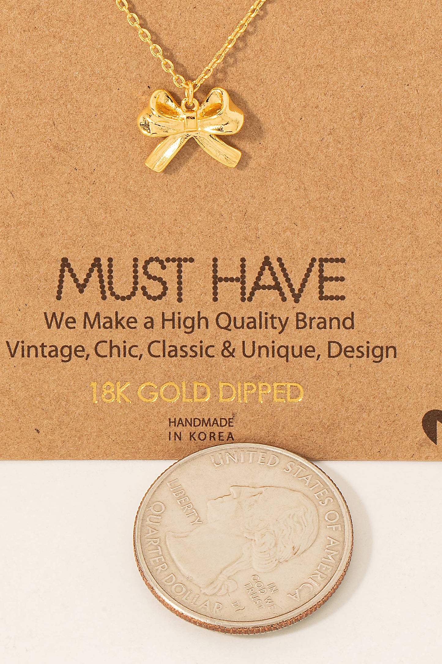 Gold Dipped Ribbon Bow Necklace: Gold