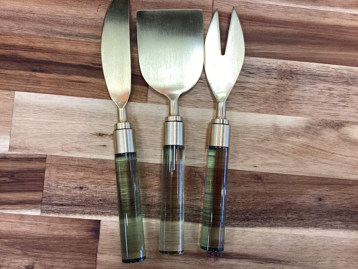 Cheese knives…gold with green handle