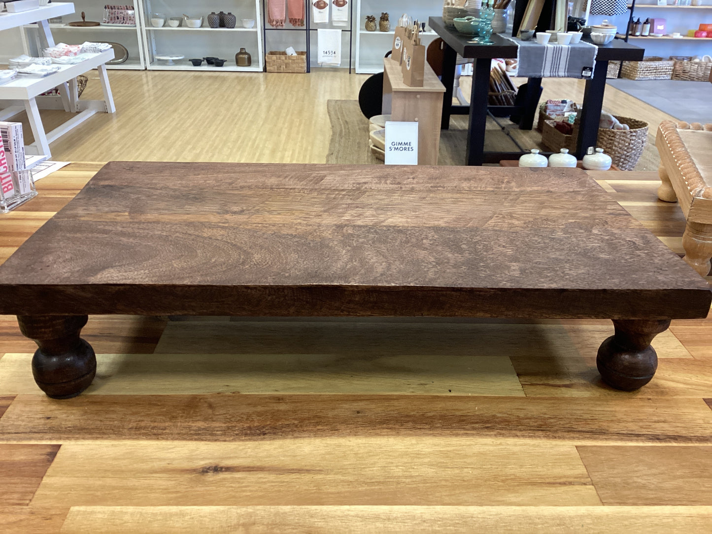 Brown wood pedestal riser