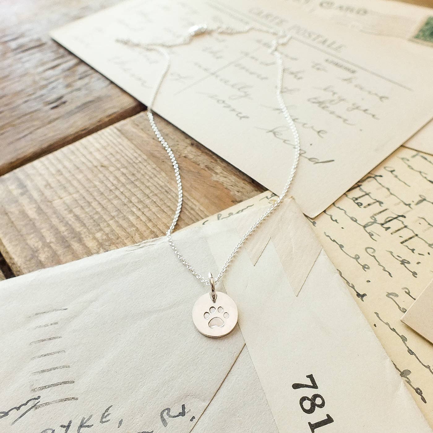 Paw Print Necklace: Sterling Silver