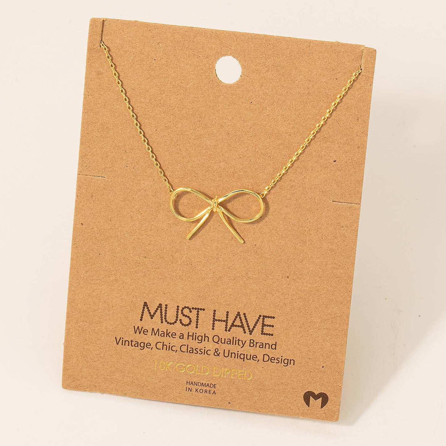 Gold Dipped Bow Tie Necklace: Gold