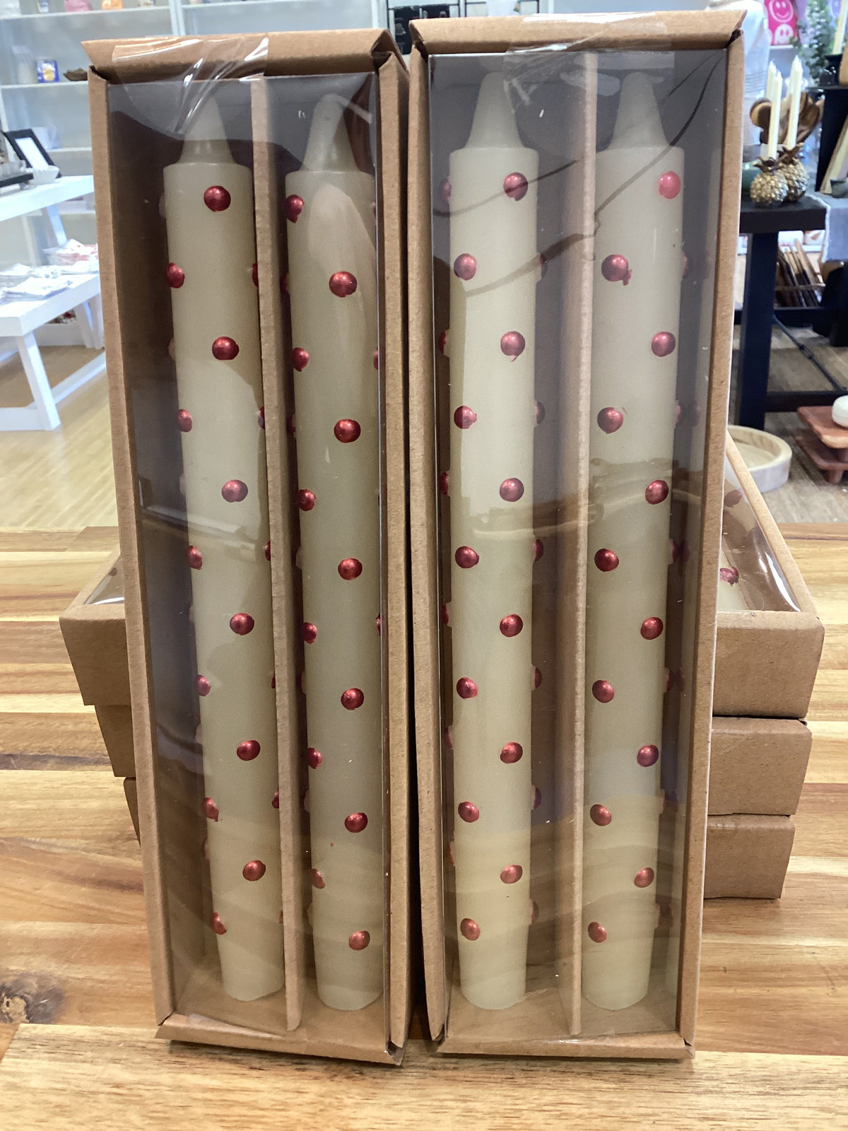 Taper candles with red dots