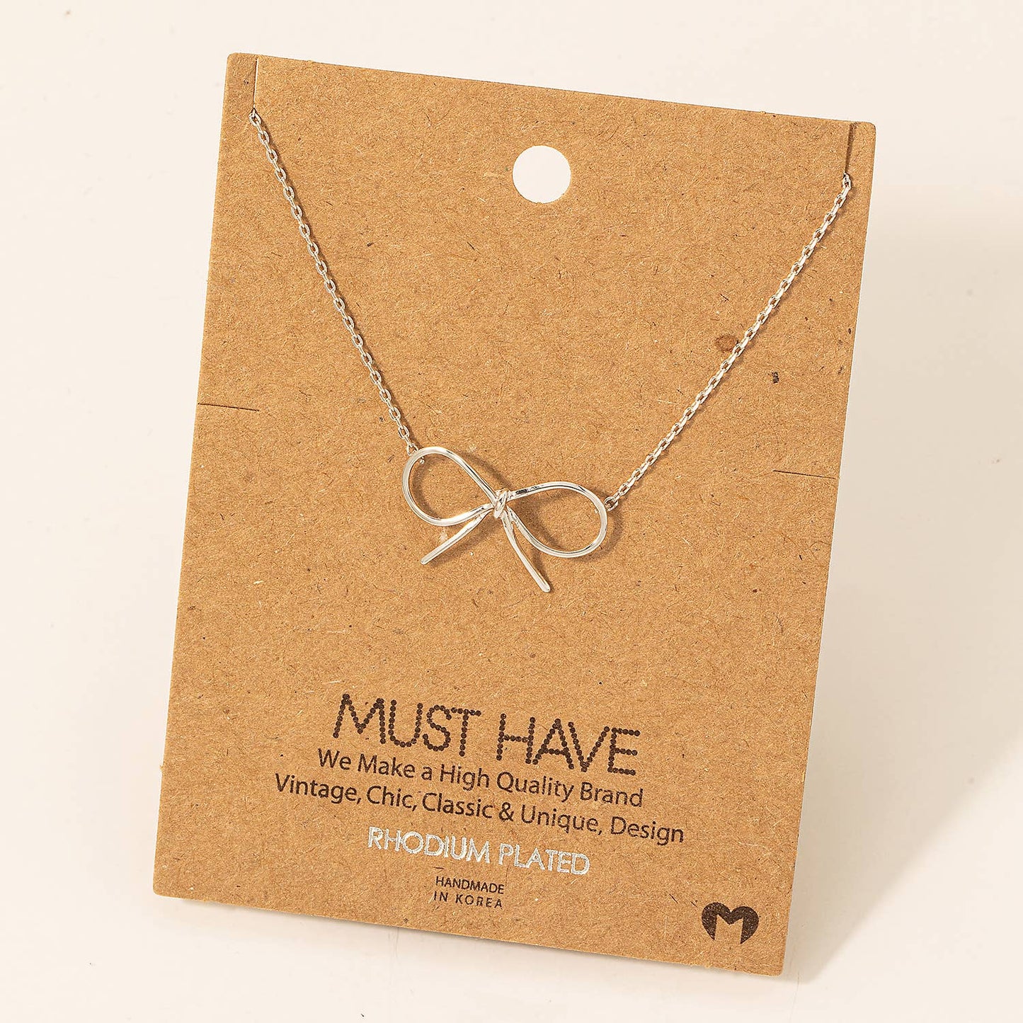 Gold Dipped Bow Tie Necklace: Gold