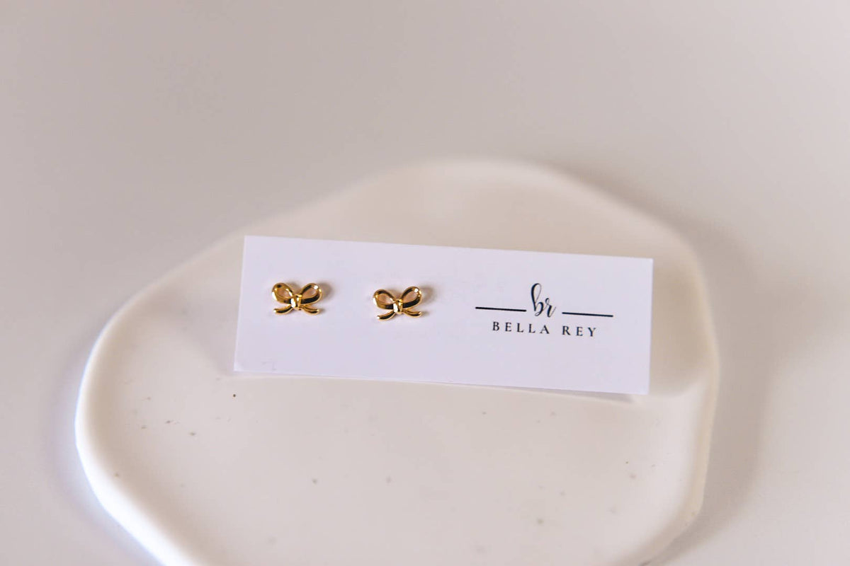 The Lela bow 18k gold plated stud earrings dainty