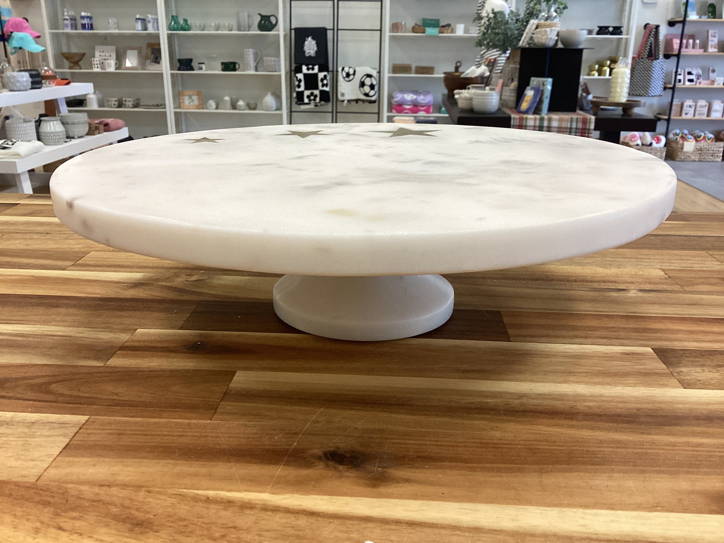 Marble pedestal brass stars