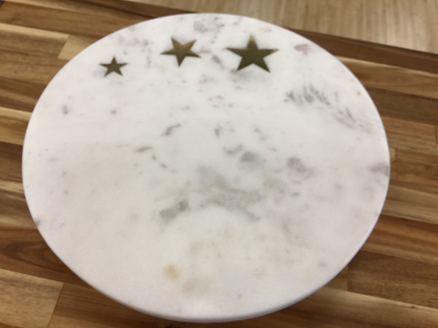 Marble pedestal brass stars