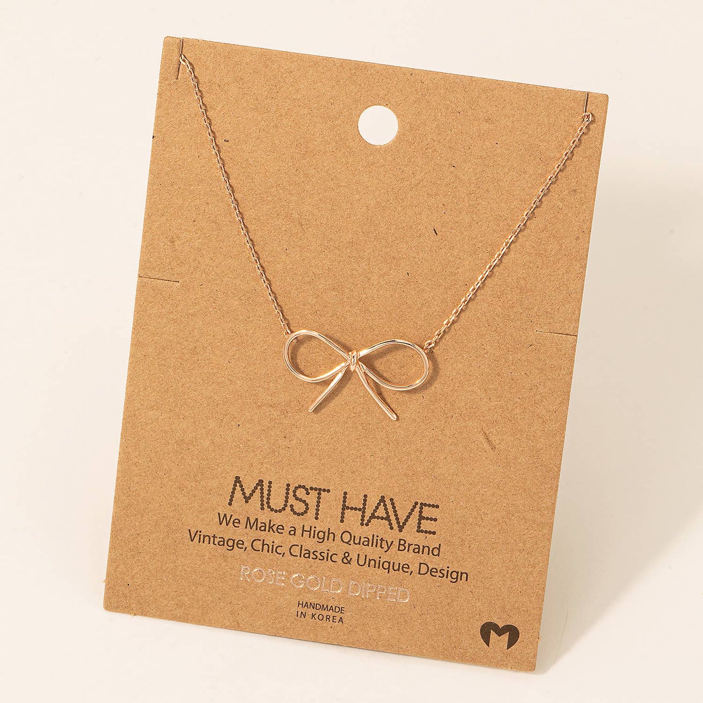 Gold Dipped Bow Tie Necklace: Gold
