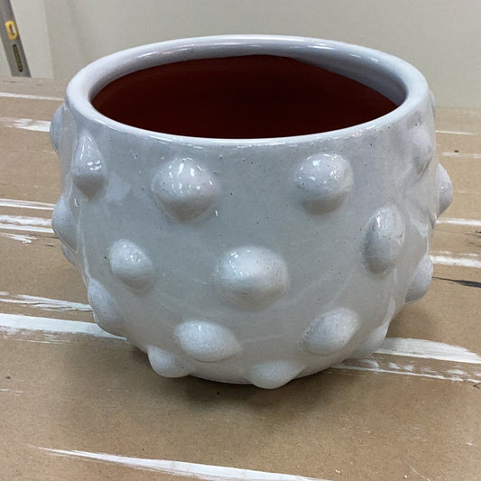 Terracotta plantar with raised dots