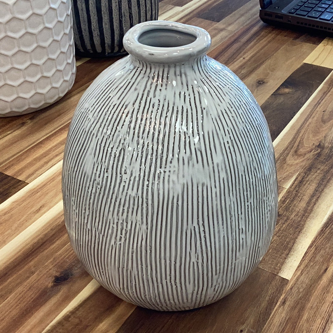 Large terracotta vase with engraved lines