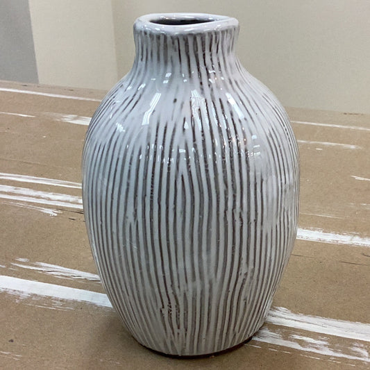 Small terracotta vase with engraved lines